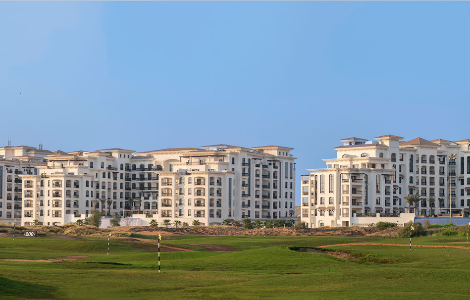 Ansam residential community on Yas Island, Abu Dhabi showcasing contemporary buildings, greenery and resort-style outdoor surroundings.jpg