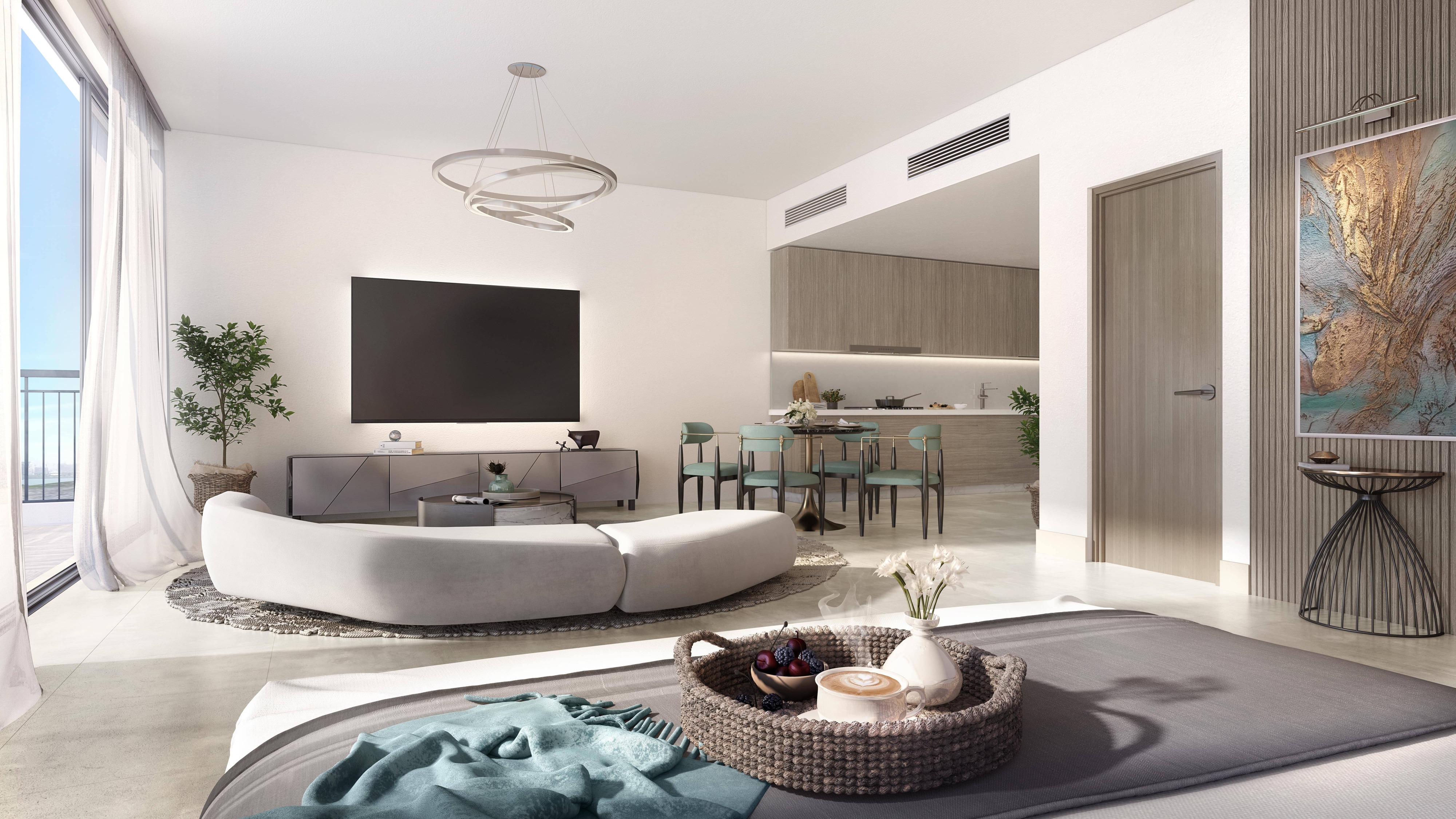 Kitchen with quartz countertop and built-in cabinets in Yas Golf Collection unit.