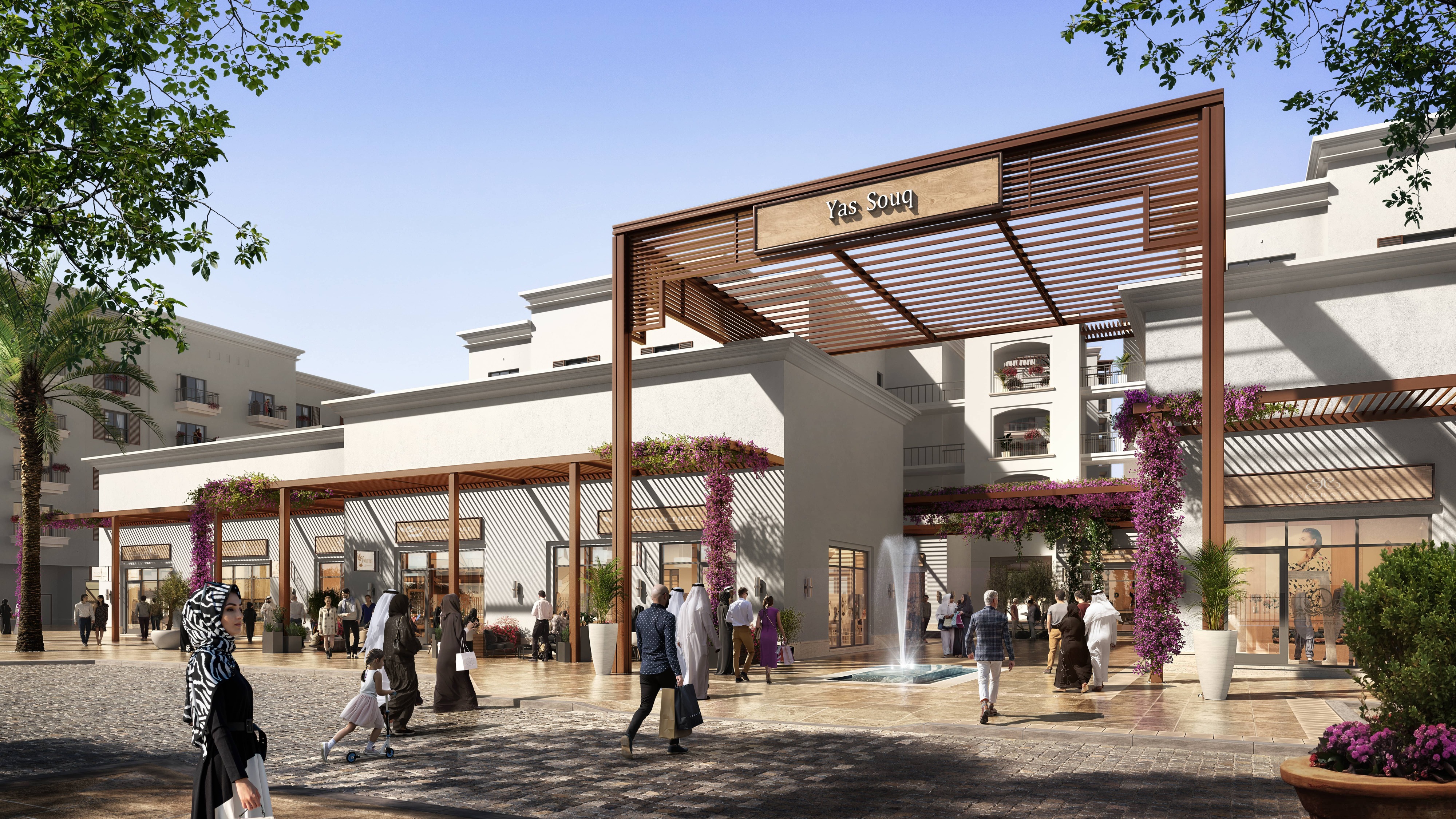 Evening exterior shot with lit podium gardens at Yas Golf Collection.